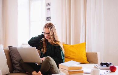 Student studying on a laptop